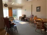 Cozy lounge area with tables and chairs