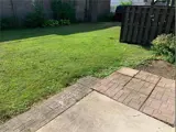 Grass and concrete patio area