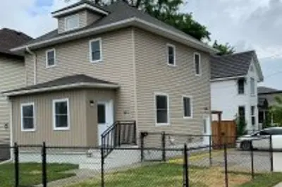 Building exterior with fenced yard