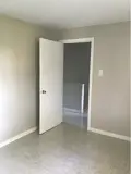 Bedroom door looking into hallway
