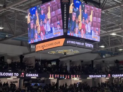 image of scoreboard at Sarnia Sting Game welcoming Newcomers