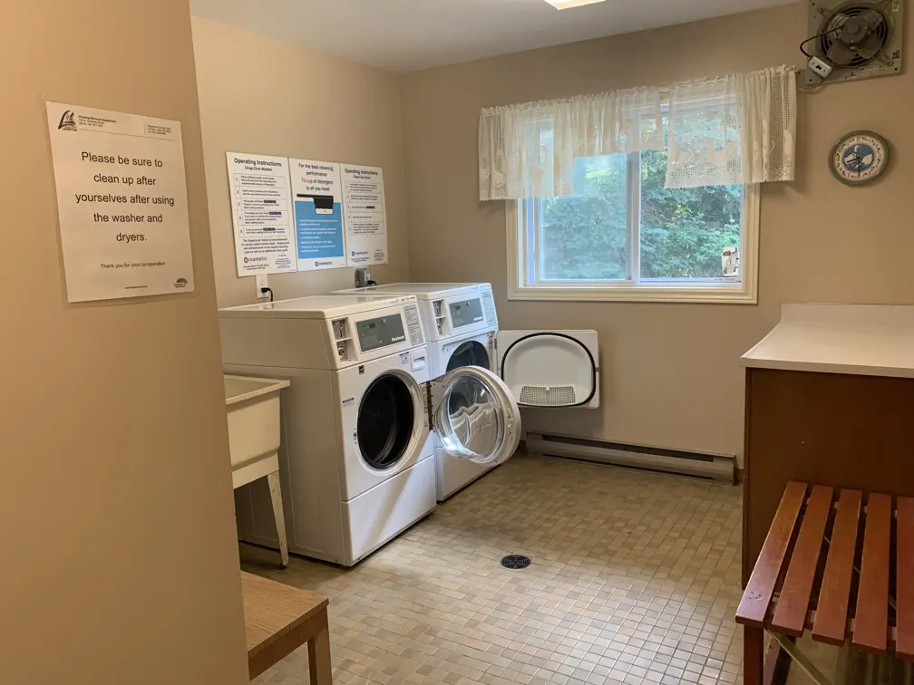 Wash basin, washer and dryer in laundry room