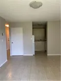 living room opening to kitchen area