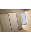 Bedroom with closet in Alvinston Apartments