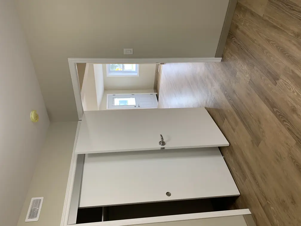 bedroom showing closet and doorway to main living area