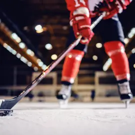 image of hockey player getting ready to shoot the puck