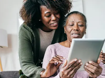 daughter-help-mother-tablet.jpg