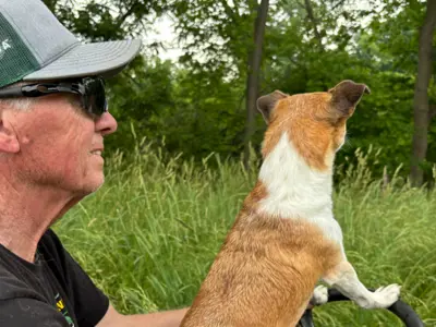 Web---Rob-Annett-and-his-dog-driving-back-after-repairing-a-fence-on-the-Annett-family-farm-in-2025.png