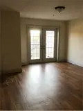 Bright living room with double doors