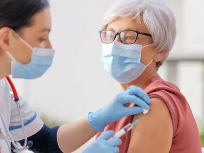 woman-gets-vaccine.jpg
