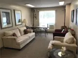 Couch, table and chairs in lounge