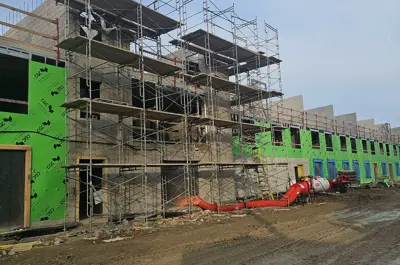 Scaffolding at the front of a building under construction