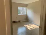 Bright bedroom with large window