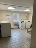 Washers and dryers in laundry room