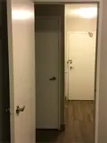 View of hallway and closet from bedroom