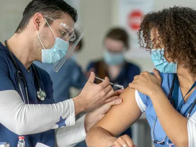 nurse-gets-vaccine.jpg