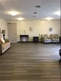 Armchairs and couches in cozy lounge area