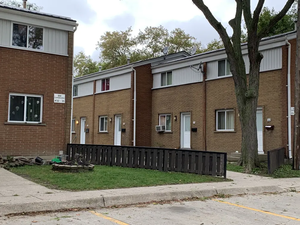 Brick and siding on townhome exterior