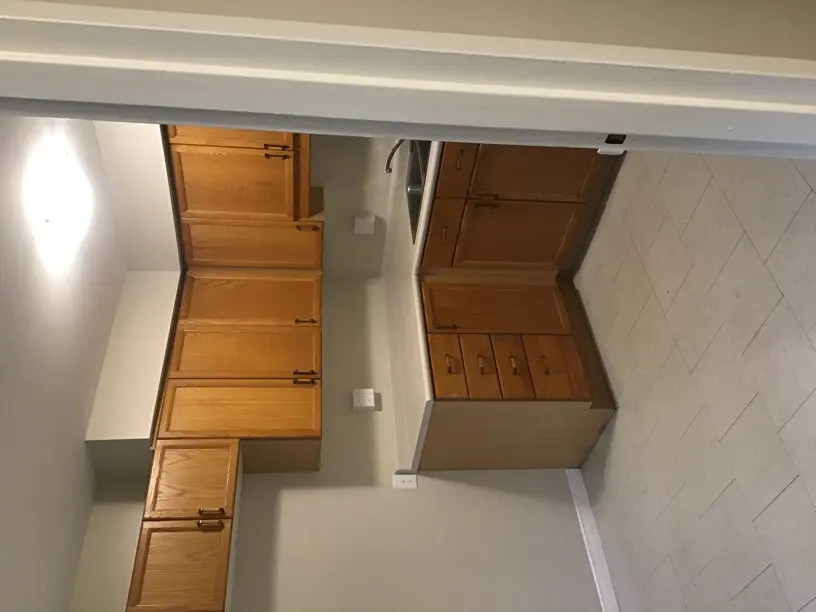 Cabinets and sink in kitchen area