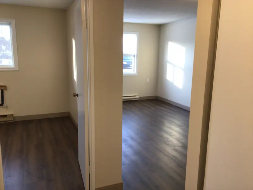 looking into bedroom from hallway