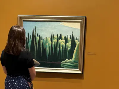 A-visitor-looks-at-Spring-on-the-Oxtongue-River-by-Group-of-Seven-artist-Lawren-Harris-currently-on-display-at-JNAAG-web.jpg
